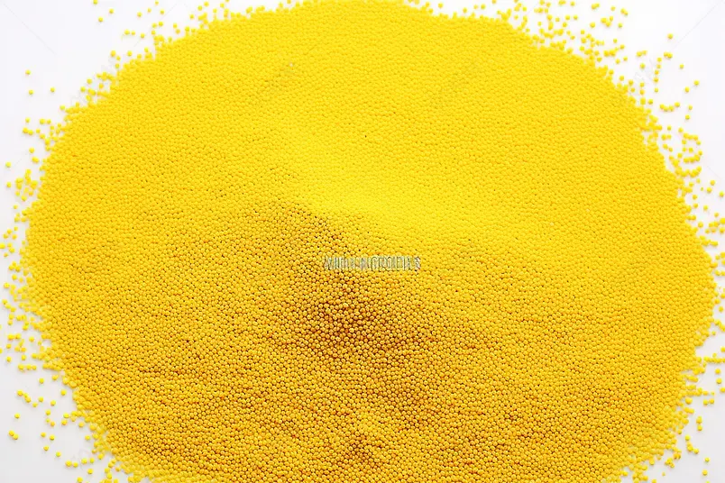 高清的图片电商产品拍摄清晰的摄影图高清的图片海报设计背景广告设计素材元素 白色背景上一堆黄色的小米