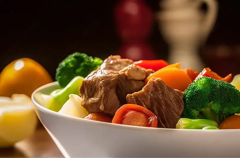 软烂入口及化圣女果牛肉蔬菜砂锅特写美食摄影背景