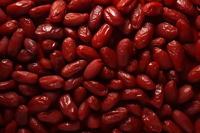 新疆大枣红枣干货红色背景摄影图