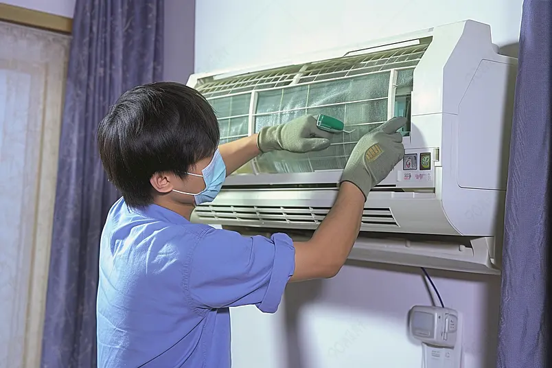 夏天工人亲自上门维修空调高清图